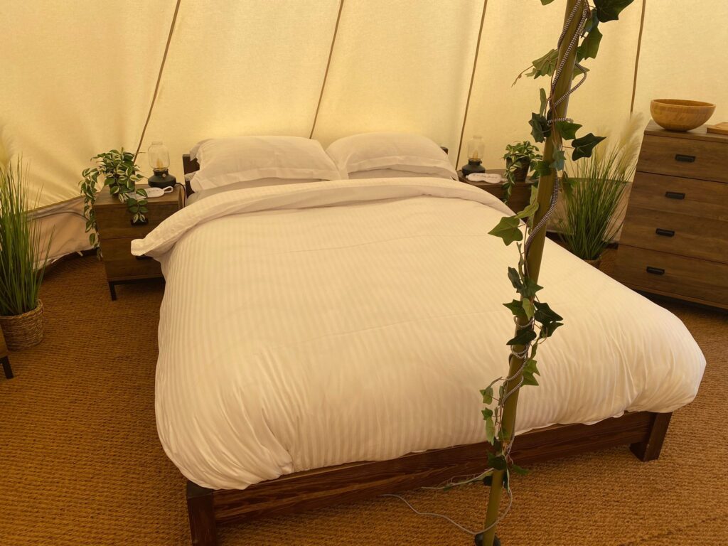 Kingsized bed in bedroom tent
