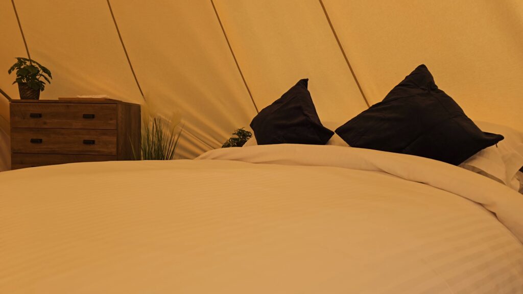 Kingsized bed in Bell Tent