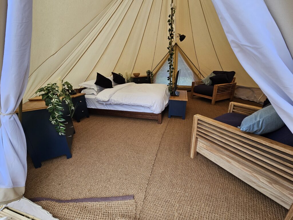wide view of bell tent interior.